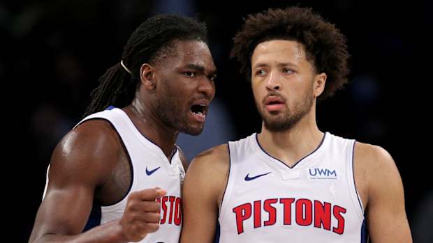 Isaiah Stewart expresses an opinion to Pistons teammate Cade Cunningham.